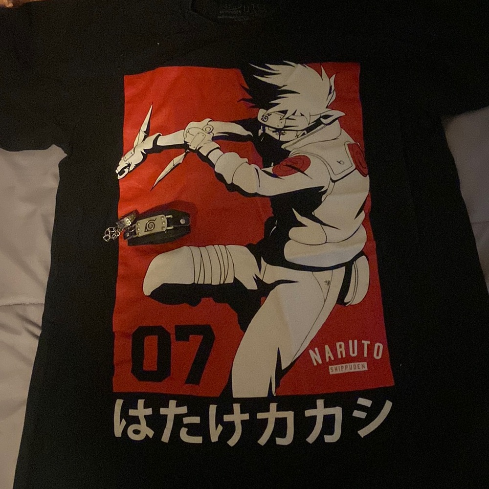 its a black kakashi shirt in medium good as new
